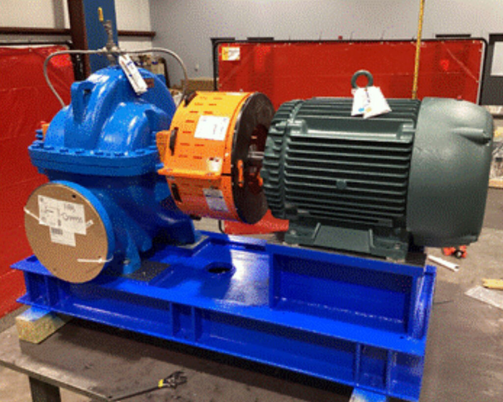 Pair of Goulds 3410 split-case pumps with 50 HP motors mounted on engineered carbon steel bases with Uniguard barrel-style pump guards