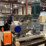 Waukesha U2-180 positive displacement pump with right-angle gearbox mounted on a stainless steel base